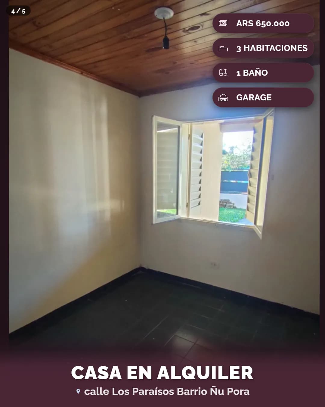 Habitación vacía con ventana abierta
