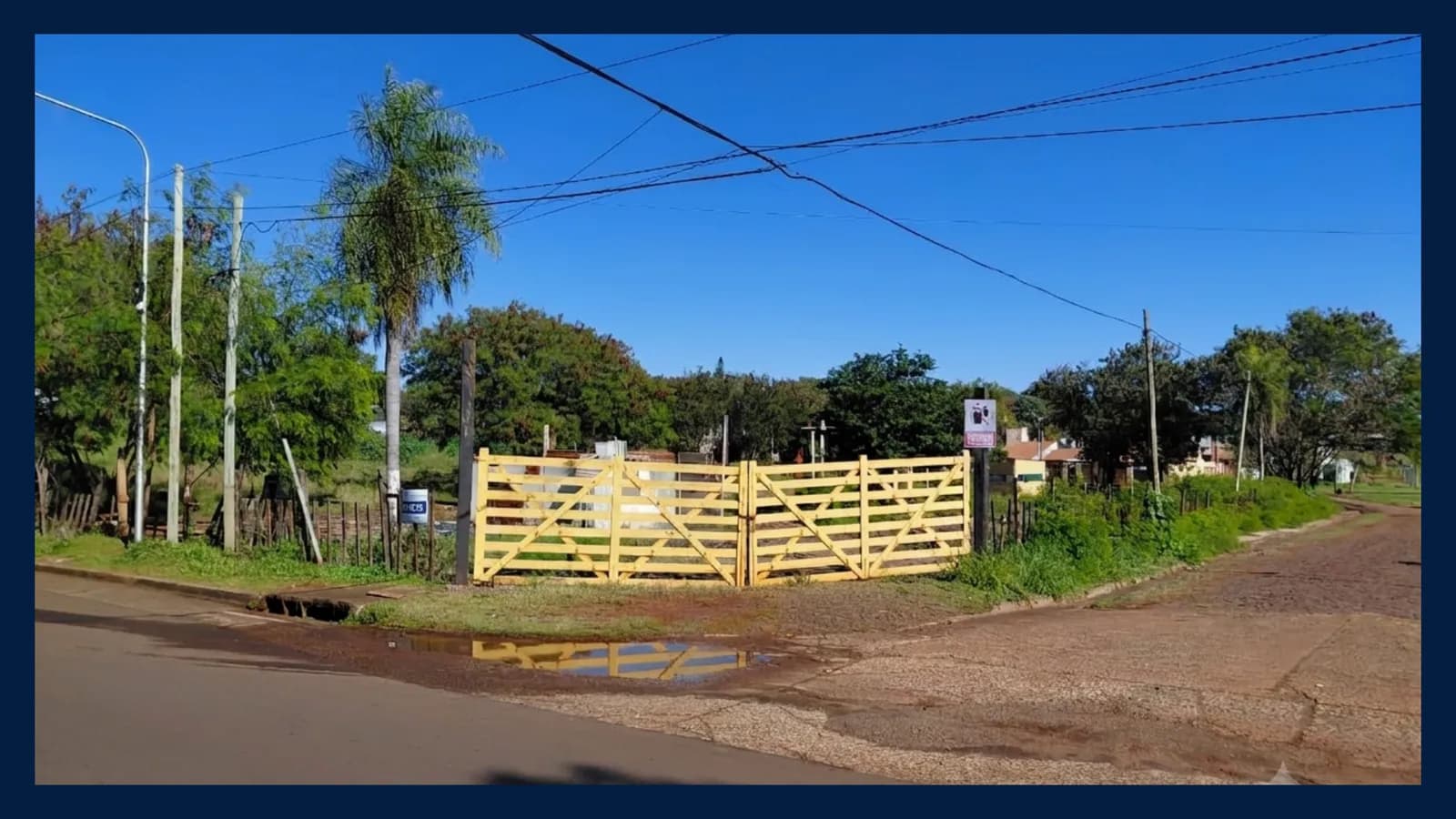 Terreno con tranquera de madera
