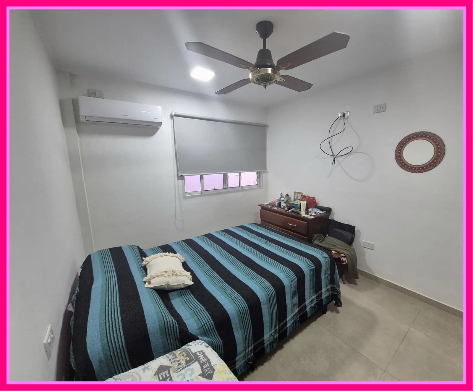 Dormitorio cómodo con aire acondicionado