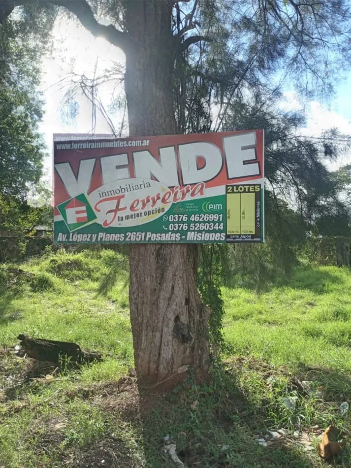 Cartel inmobiliario de venta de lotes