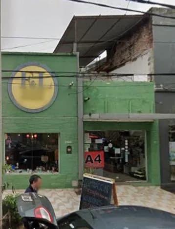 Fachada de local comercial verde