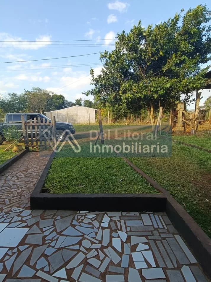 TERRENO CON CASA. Barrio Malvinas, San Vicente Mns